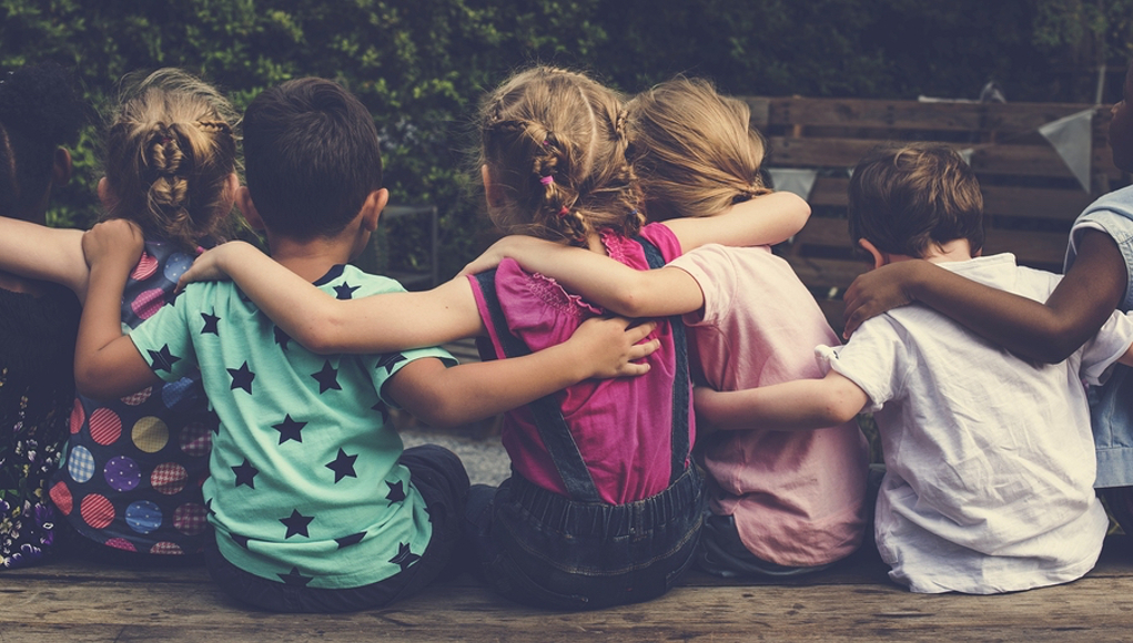 Group of kids sitting together